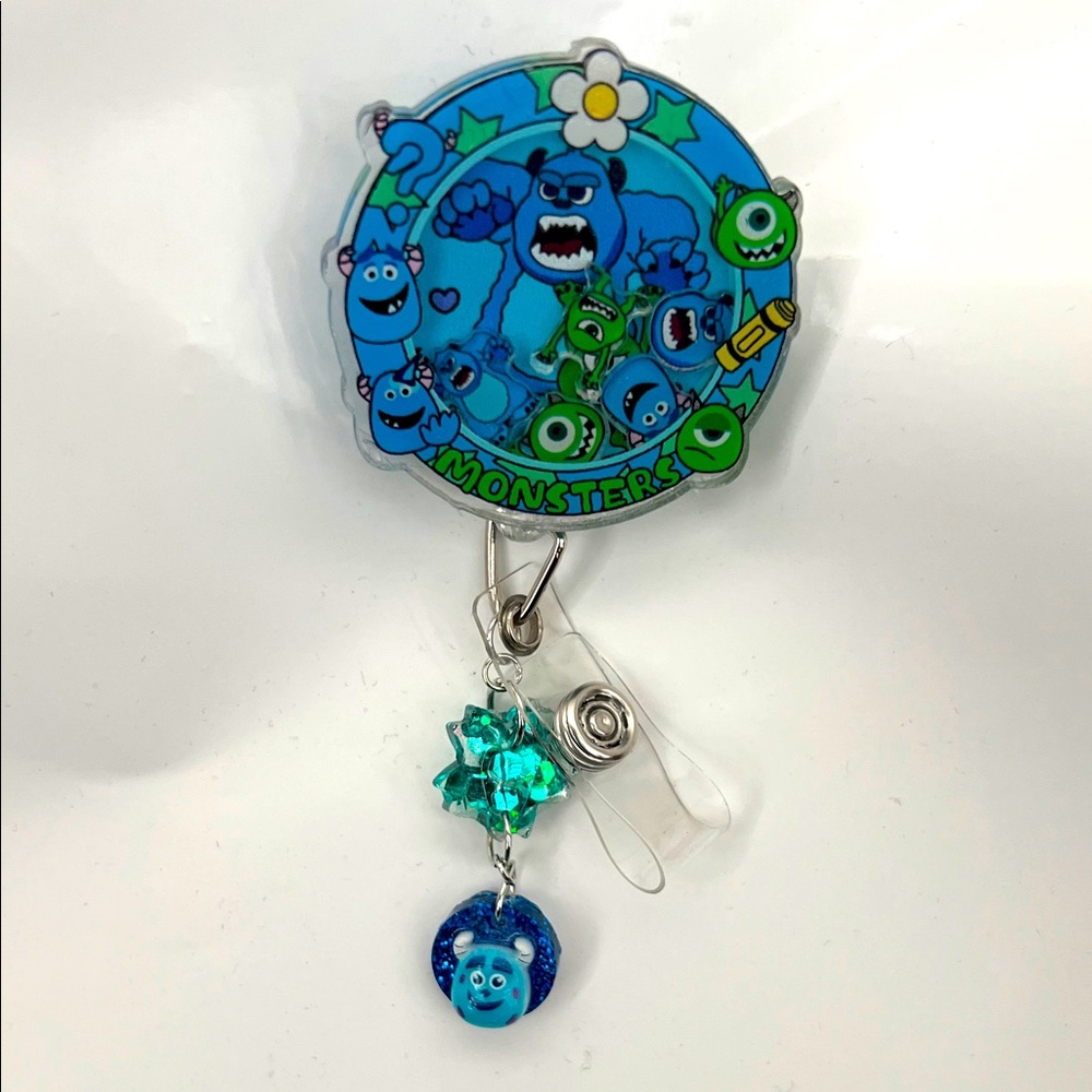 New Monster inc. shaker Badge Reel with custom Charms